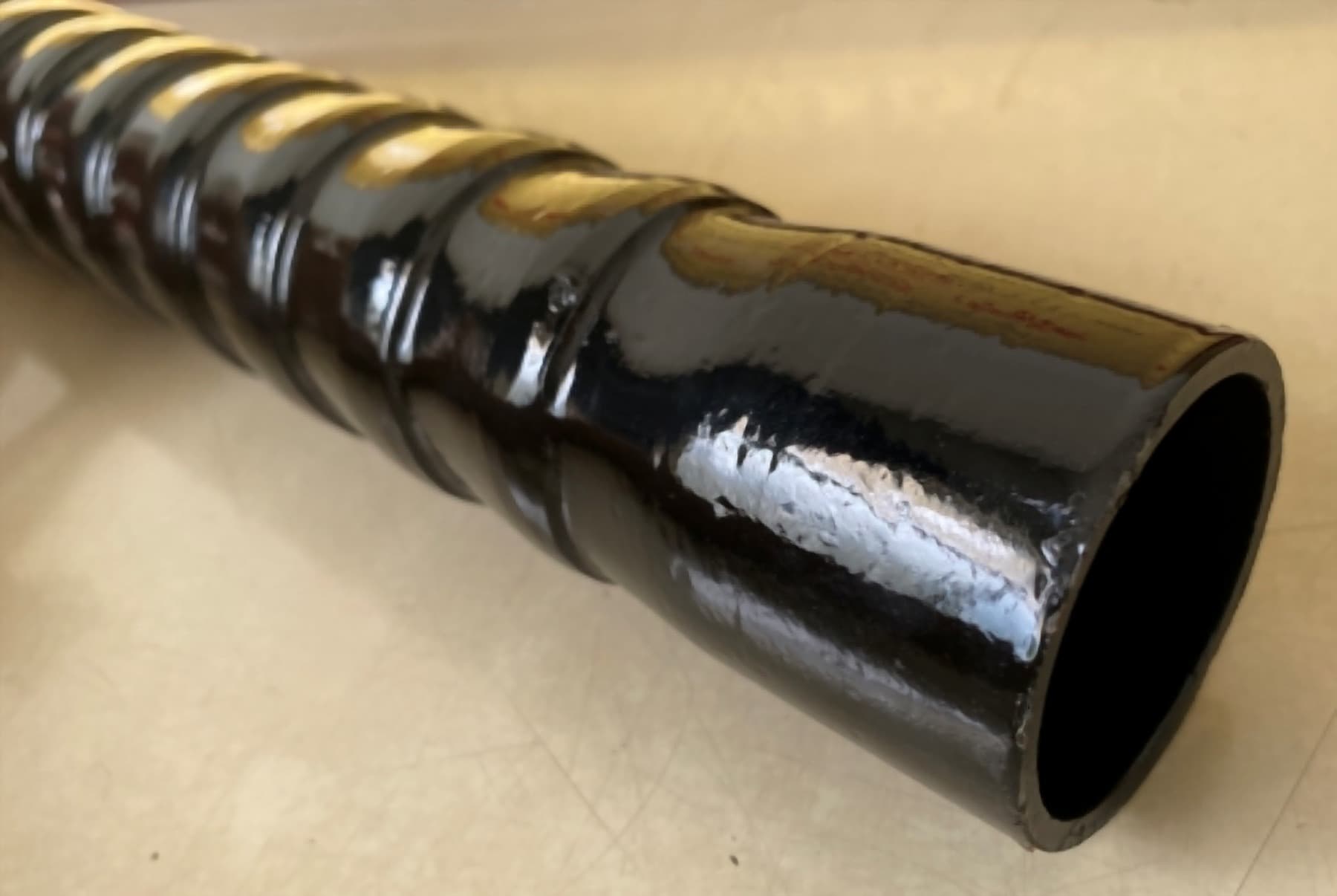 Corrugated and helical-groove seamless heat-exchanger tube